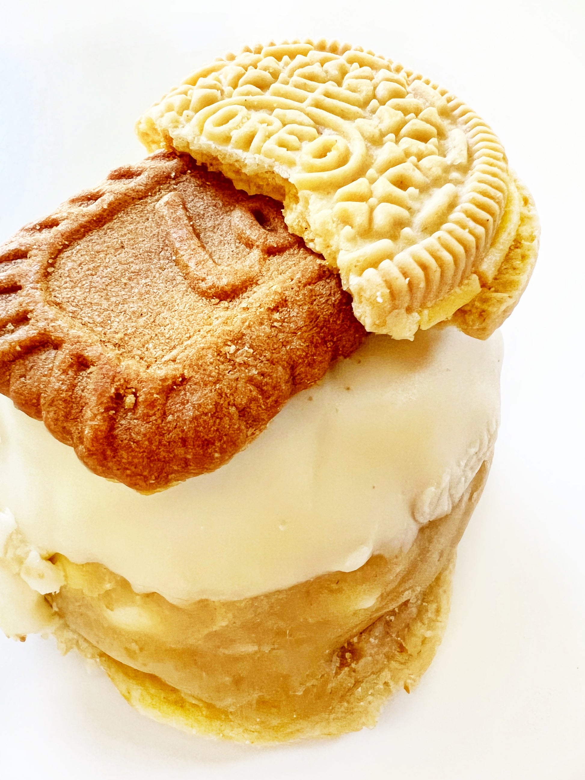 Lemon oreo and biscoff cookie opped cookie butter stuffed cookie